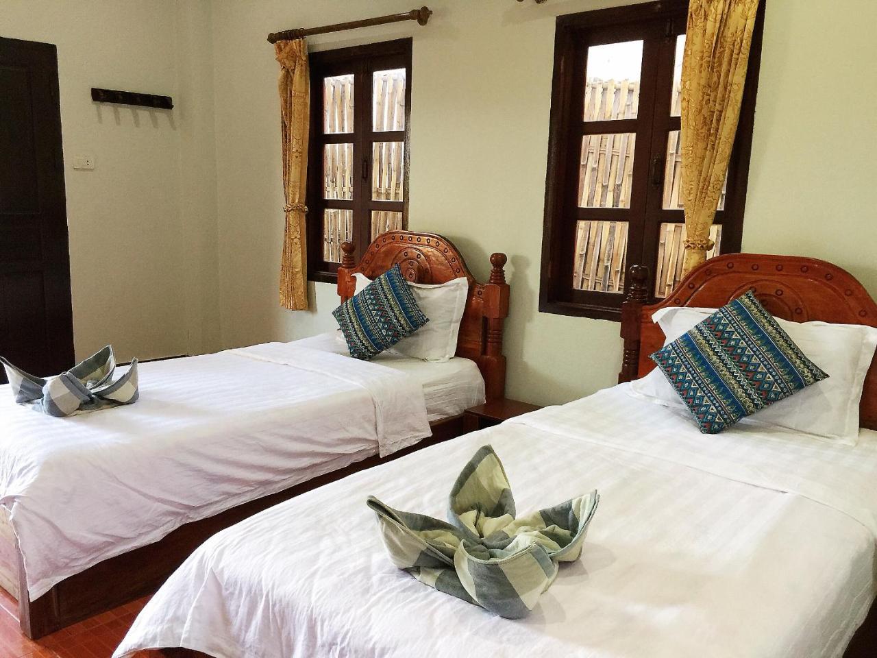 לואנג פרבאנג Mao Phasok Riverside Guesthouse מראה חיצוני תמונה