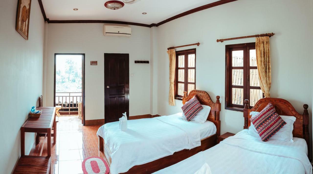לואנג פרבאנג Mao Phasok Riverside Guesthouse מראה חיצוני תמונה