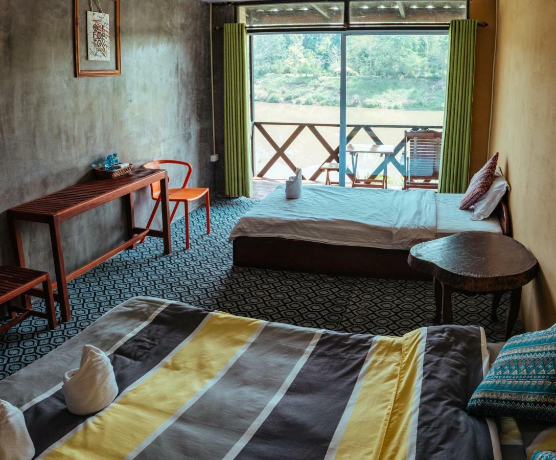 לואנג פרבאנג Mao Phasok Riverside Guesthouse מראה חיצוני תמונה